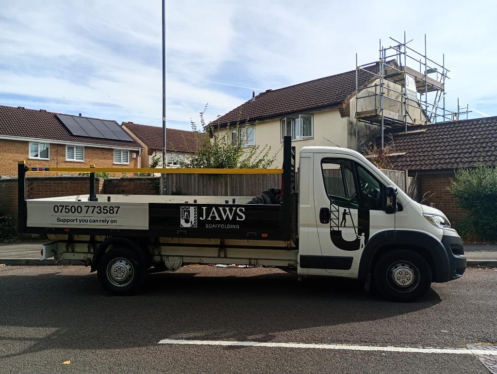 JAWS Scaffolding truck on a residential street